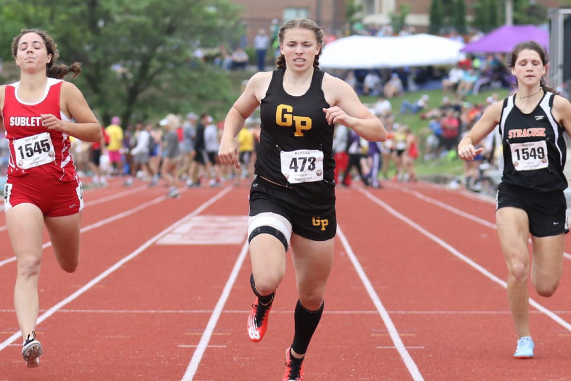 Garden Plain's Brooke Hammond (center) started off her high school track career in style earning gold medals in the 100, 200 and 400 relay in just her freshman season at May's Kansas State Track &amp; Field Championships. (Photo by Huey Counts)