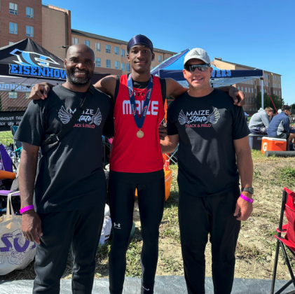 (L-R): Alan's father Jason Hanna, Alan Hanna and Maize High jumps coach Jared Handy. (Photo: Zoey Franklin)